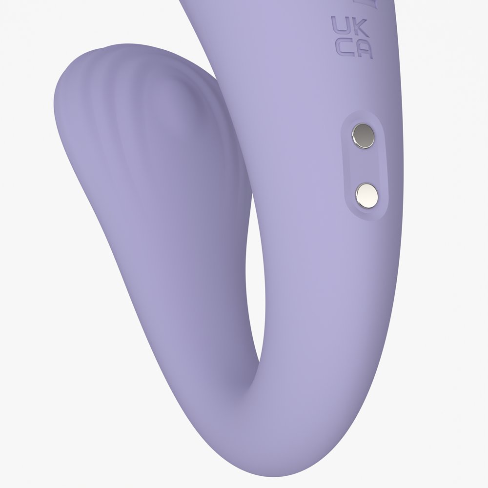 Close-up product image of the Velvet Rituals Eclipse couples vibrator on a white background, showing the curved dual-arm design, textured silicone surface, and magnetic charging contacts