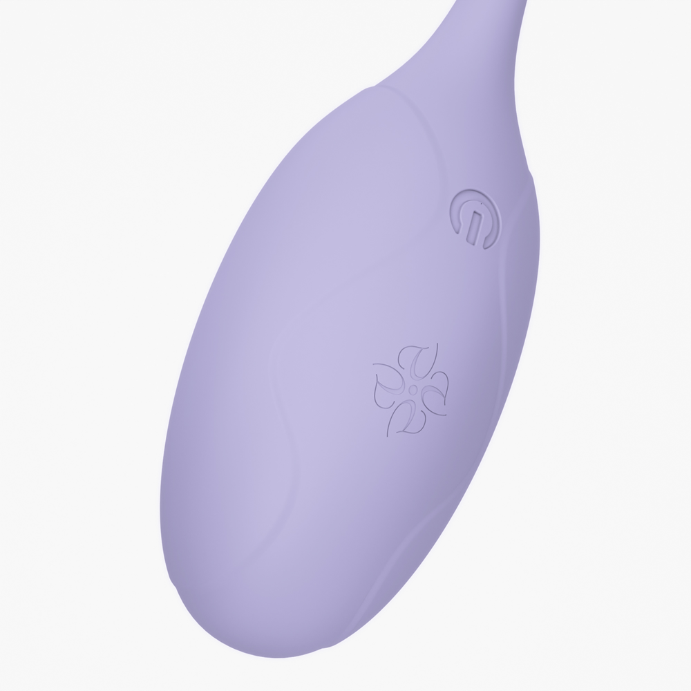 Close-up of the Velvet Rituals Pearl internal massager in a soft lavender finish, highlighting its smooth ergonomic design and control button