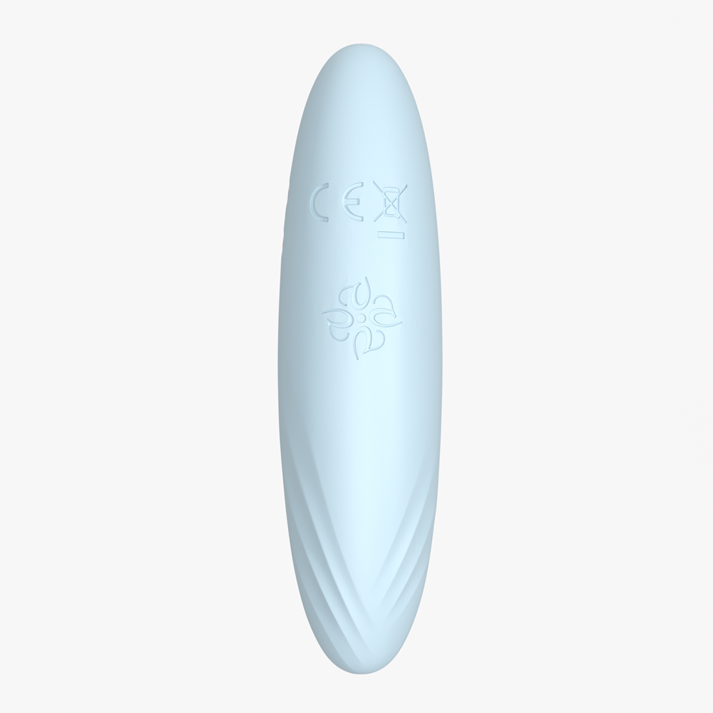 Back view of the Velvet Rituals Pixie compact external pleasure device on a white background, showing CE markings and product certification details