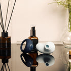 Velvet Rituals Aurora and Orion devices displayed together with Pure lubricant in a premium lifestyle setting, highlighting a complementary pleasure combo