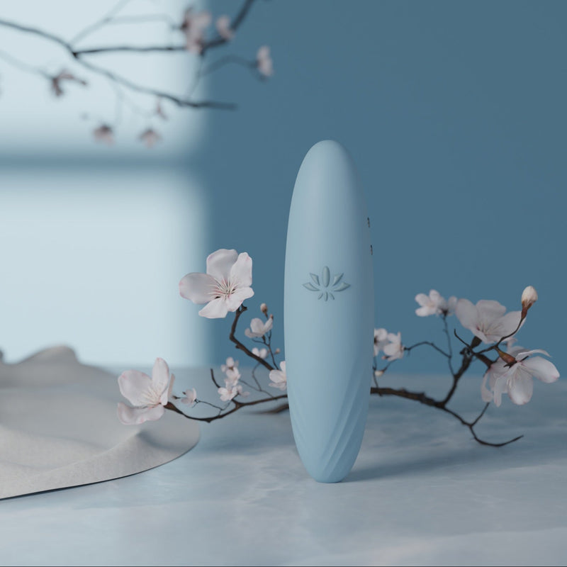 Velvet Rituals Pixie compact external pleasure device displayed as a hero shot, highlighting its sleek design and soft, minimalist aesthetic