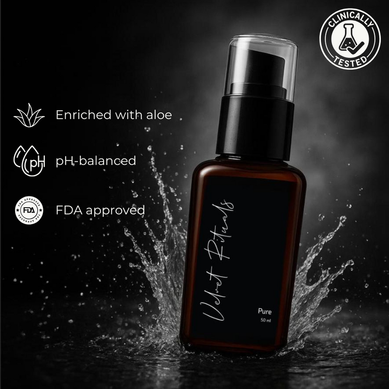 Velvet Rituals Pure lubricant bottle shown in a dramatic water splash hero shot, highlighting aloe enrichment, pH-balanced formula, and clinically tested safety