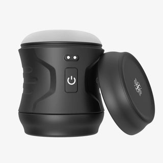 Velvet Rituals Vortex male massager with protective cap
